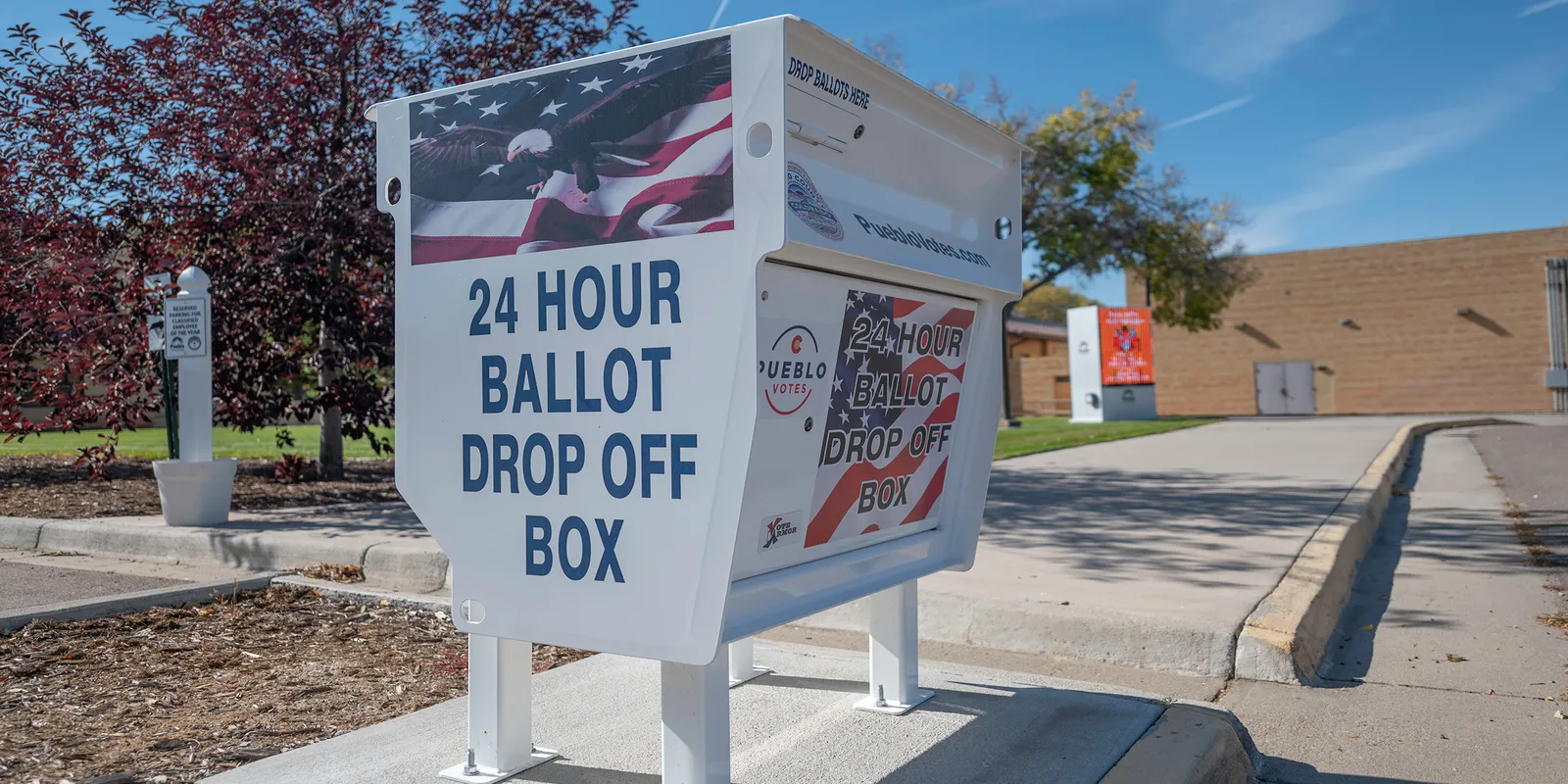 A 24 hour ballot drop off box on a sidewalk